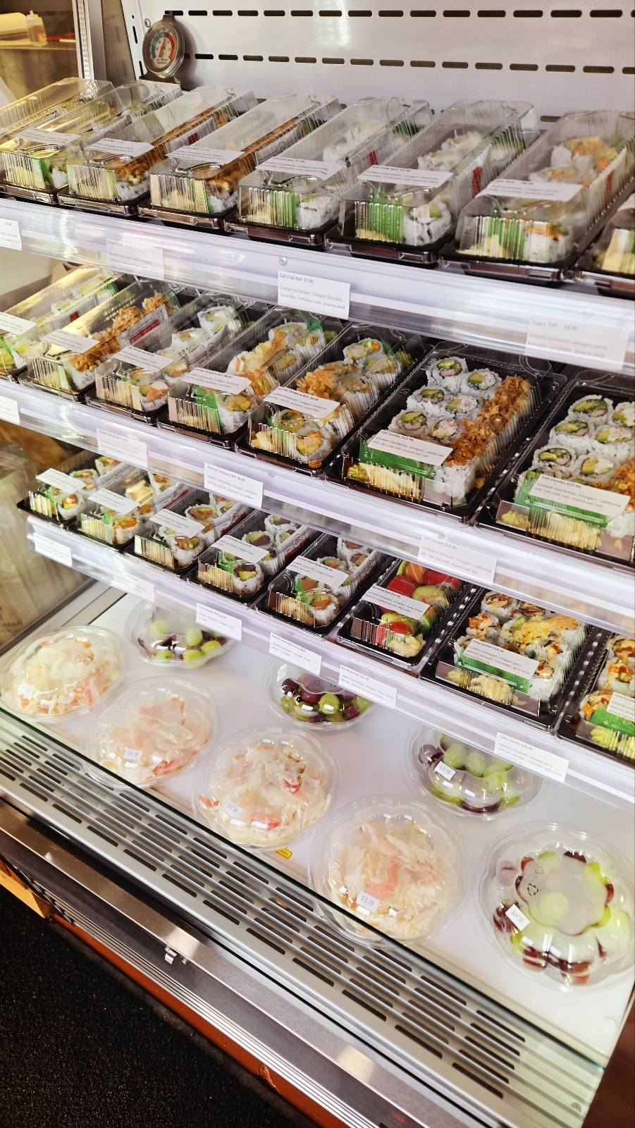 Sushi counter with rolls and nigiri